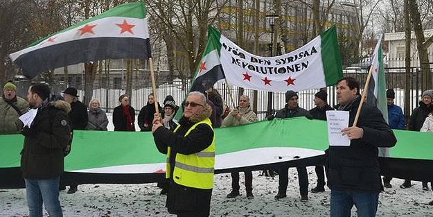 İsveç'te Putin ve Esed protesto edildi