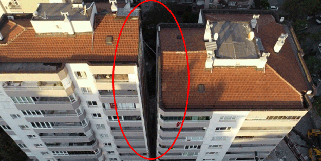 İzmir depreminde ilk 3 katı çöktü! Yan yatan bina böyle desteklendi