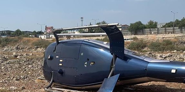 İzmir'de helikopter yan yattı