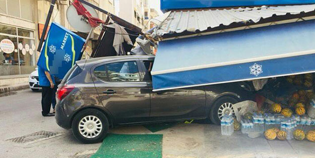 İzmir'de otomobil manav tezgahına daldı, faciadan son anda dönüldü