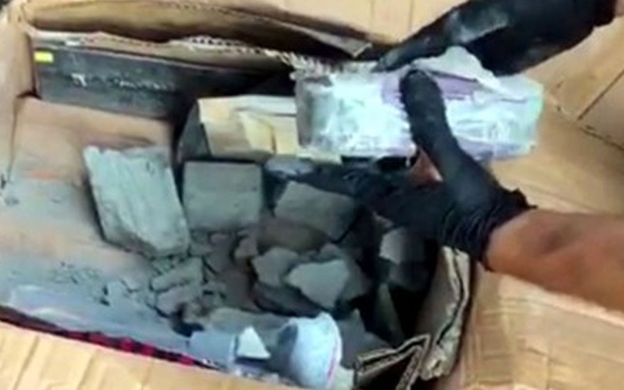 Kargo şirketinde paketleri açan polis gözlerine inanamadı