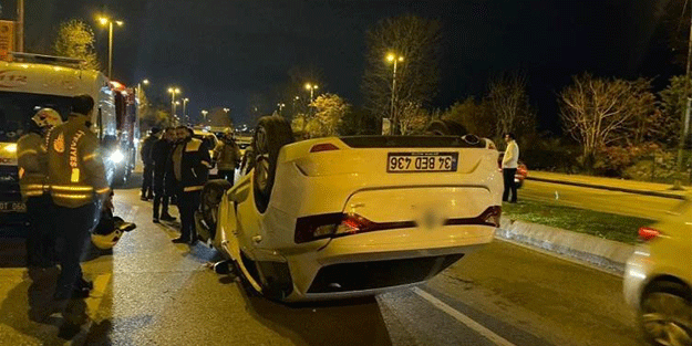 Kartal'da virajı alamayan otomobil takla attı