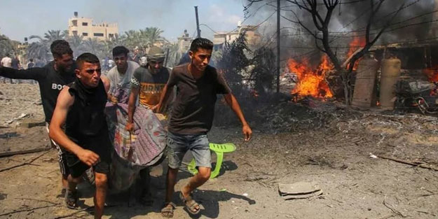 Katil İsrail'in katliam bombardımanında cesetler eridi