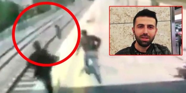 Kız çocuğunu raylara atlayarak saniyelerle kurtardı!