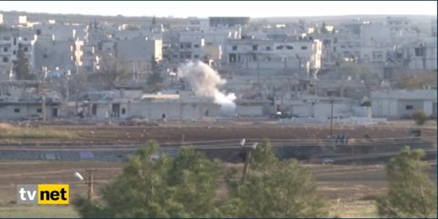 Kobani'de evden eve roket savaşı