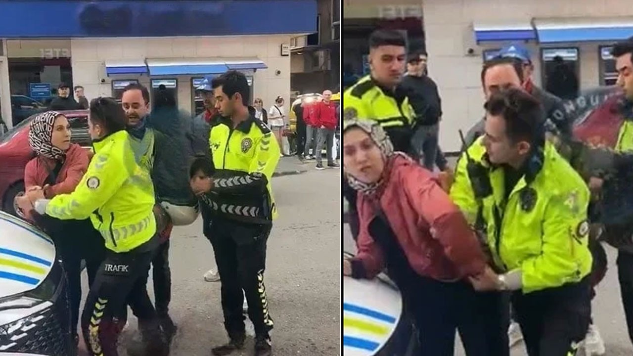 Kocasına ceza yazılmasın diye polise saldırdı…Kocası sessizce olanları izledi