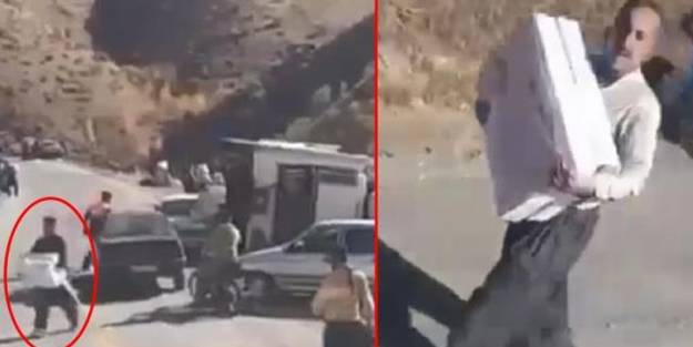 Komşu'da skandal görüntüler: Kaza yapan Türk tırını yağmaladılar!