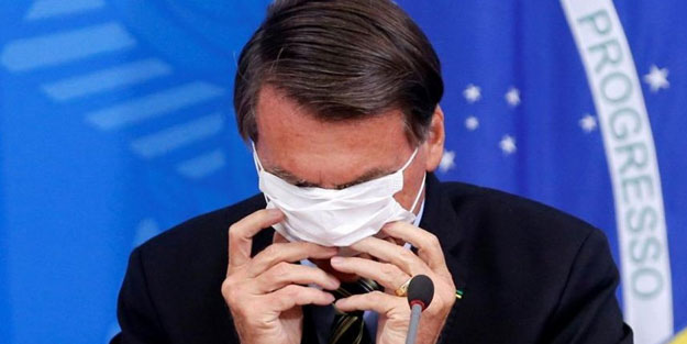 Koronavirüse yakalanan Bolsonaro'dan maske şovu
