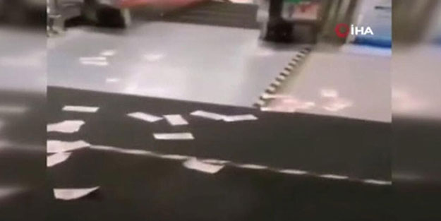 Koronavirüsten ağzı yanan Çinliler etrafa saçılan paraya dokunmaya bile cesaret edemedi