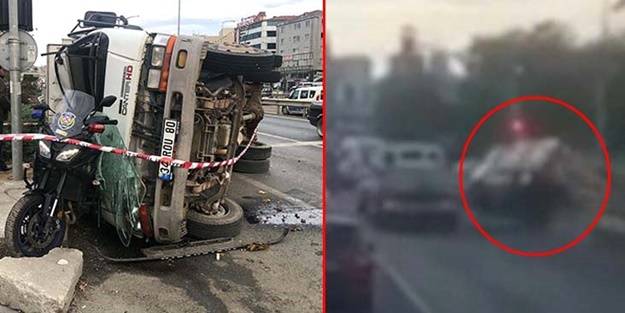 Kum kamyonu polisin üzerine devrildi!