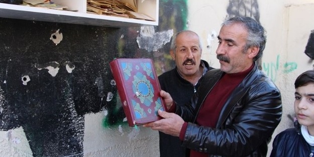 Kur'an-ı Kerim'e kurşun sıktılar... Kitapsız köpekler!