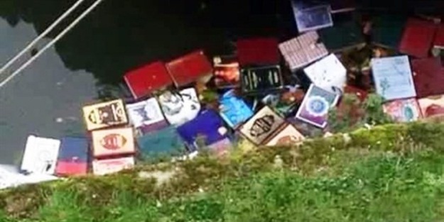 Kur'an-ı Kerim'leri su kanalına attılar