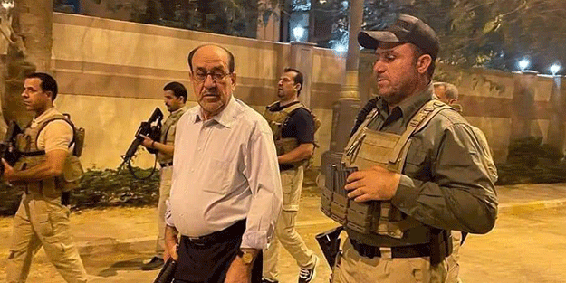 Maliki’den silahlı poz!