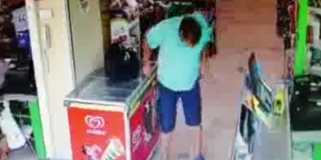 Marketin ortasında iğrenç olay!