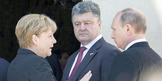 Merkel, Poroşenko ve Putin'le Ukrayna'yı görüştü