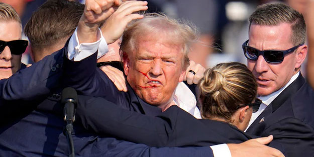 Mermi mi yoksa metal parçası mı yaraladı? ABD'de Trump tartışması