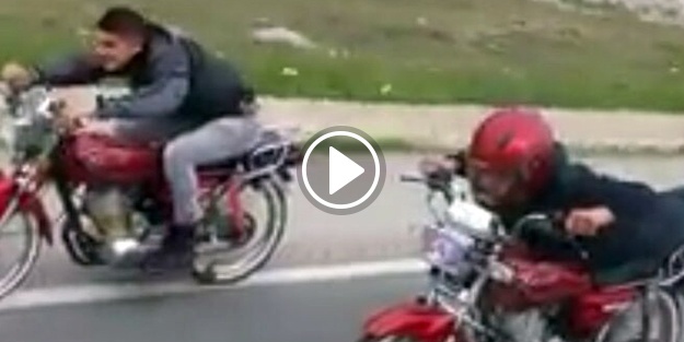 Motosiklet üzerinde tehlikeli yolculuk!