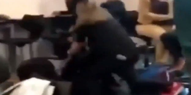 Müslüman öğrenciye alçak saldırı! Başörtüsü çıkarmaya çalıştılar