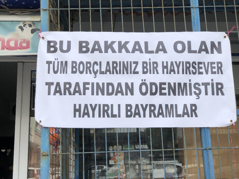 Önce veresiye borçları ödediler sonra pankart astılar 