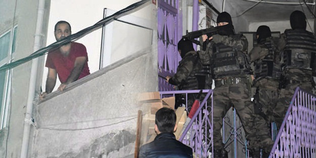 Operasyonda 'imdat polis' diye balkona fırladı