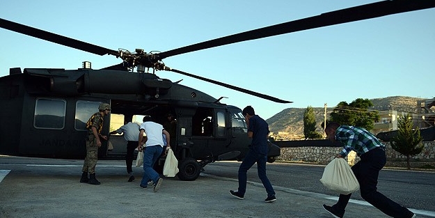 Oy pusulalarını helikopterler taşıdı