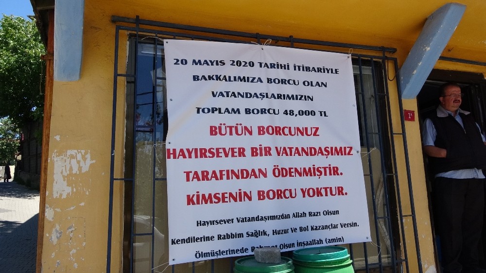 (ÖZEL) Gizemli hayırsever kadın mahallelinin 20 yıllık veresiye borcunu kapattı 