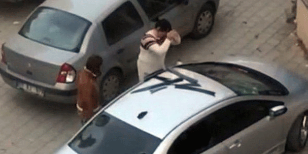 Parke taşları ile böyle parçaladı… ‘Kocamın aracı size ne!’