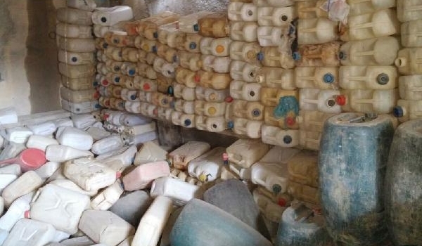 PKK'lıların terk ettikleri binada silah ve mühimmat ele geçirildi
