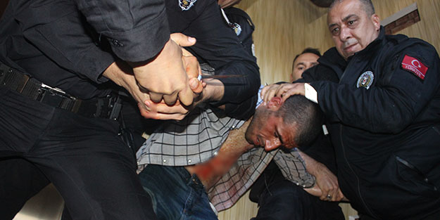 Polise direnen kişi itfaiyenin suyla müdahalesiyle etkisiz hale getirildi