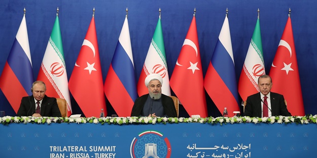 Putin: Erdoğan'ın teklifiyle silahları bırakma çağrısı yaptık
