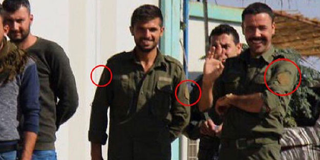 Rus polisiyle görüntülenen teröristlerin elbisesi dikkat çekti!