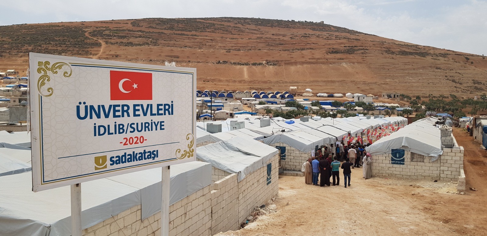 Sadakataşı İdlib’de briket ev açılışlarını sürdürüyor