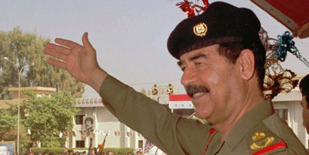 Saddam resimli saat satan kişi gözaltına alındı