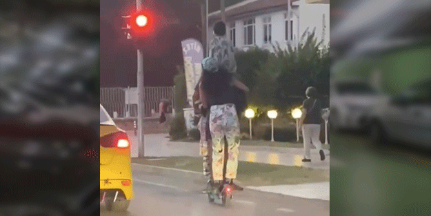 Scooter'da ölüme meydan okudu! Biri omuzda 4 kişi böyle yolculuk etti