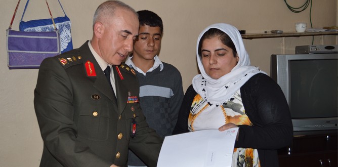 Şehid eşine Özel’den davet