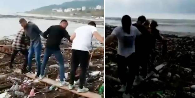 Selde köpeğin insan zinciri oluşturularak kurtarılma anı dünya basınında