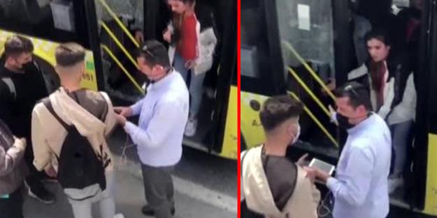 Sinirlenip otobüsün camını kırdı