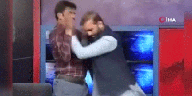 Sinirlerin gerildiği canlı yayında yumruk yumruğa kavga!