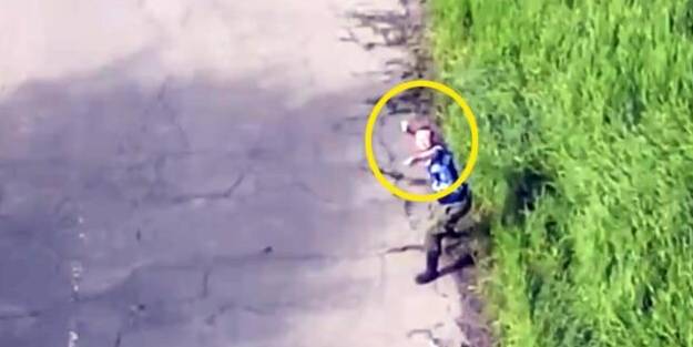 Şok eden görüntü! SİHA'ya taş attı