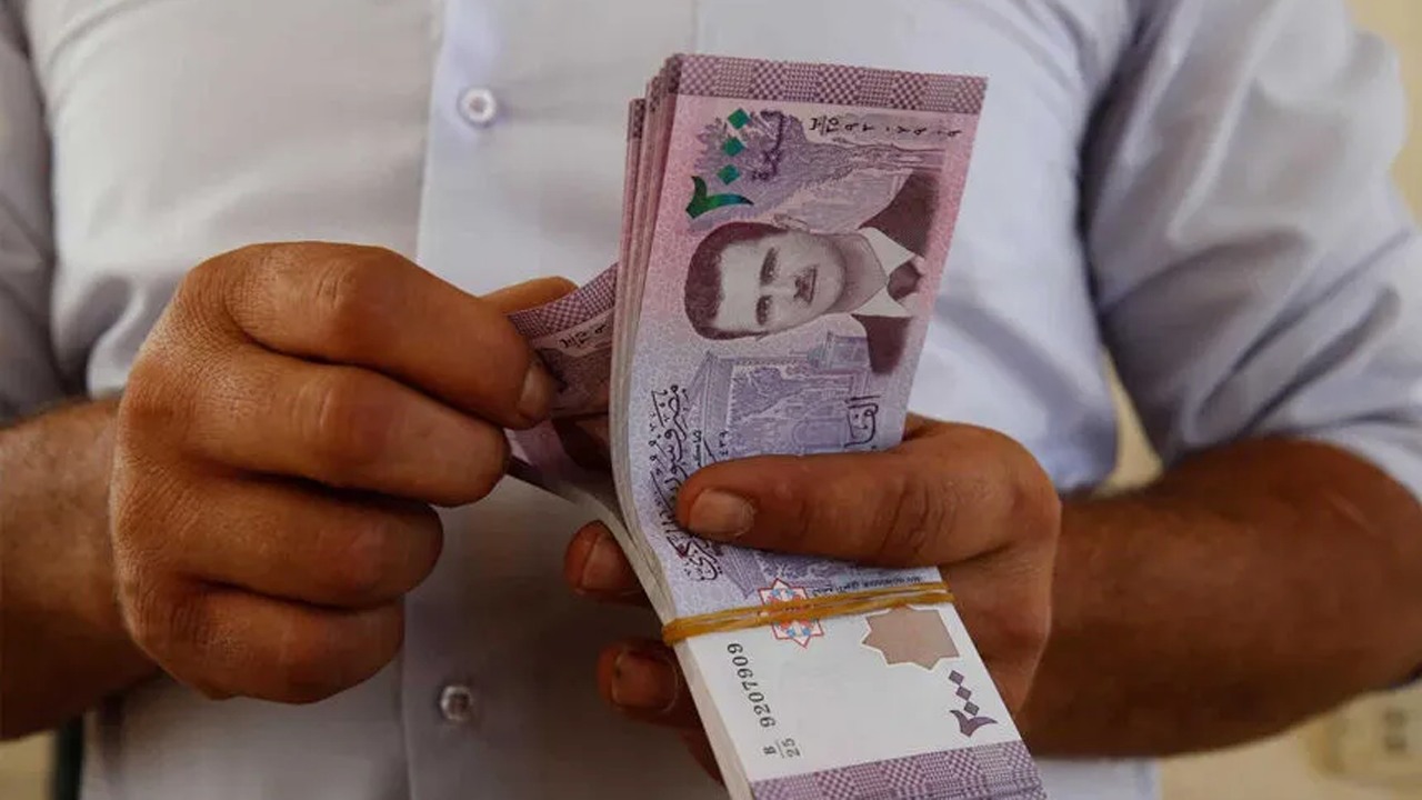 Suriyede Esed'in yüzü banknotlardan...