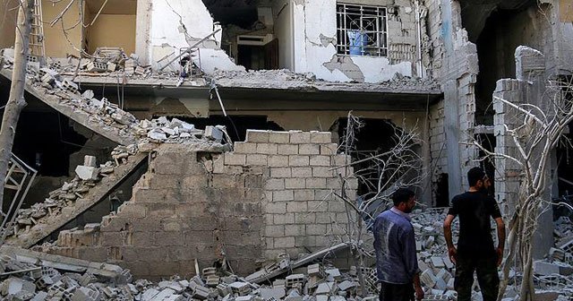 Suriye'de rejim güçleri yerleşim alanlarını bombaladı