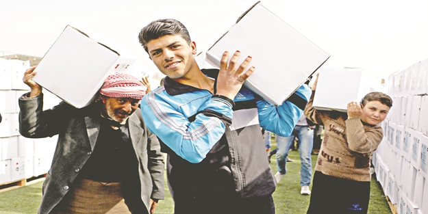 Suriyelilerin gıda sevinci