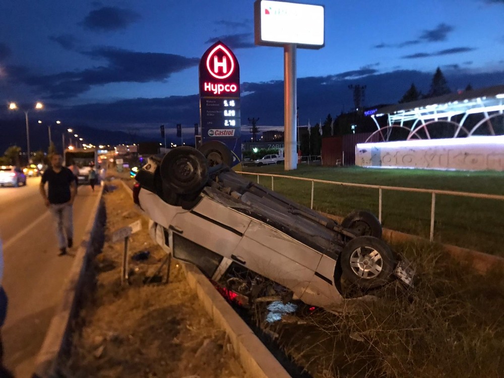 Takla atan otomobilden yara almadan kurtuldu 