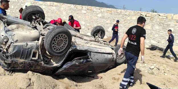 Takla atan otomobilin sürücüsü feci şekilde can verdi