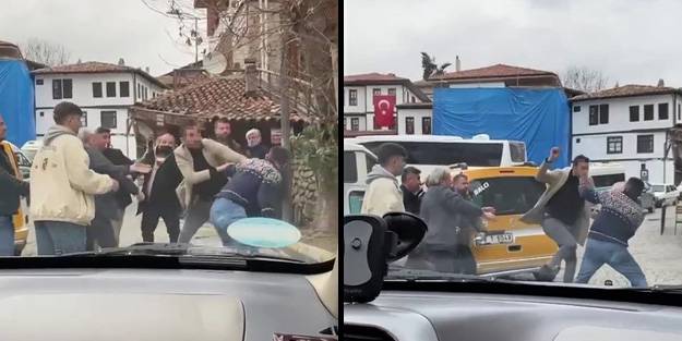 Yumruklar havada uçuştu! Taksici ve minibüs şoförünün tekme tokat kavgası böyle kaydedildi!