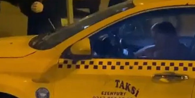 Taksicinin boğazını kesti!