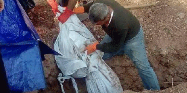 Tepkiler üzerine teröristin cesedi mezardan çıkarıldı
