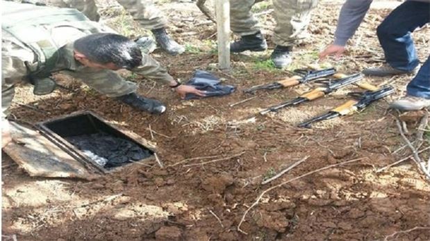 Toprağa gömülü halde silah bulundu