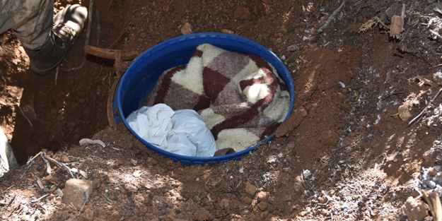 Toprağa gömülü vaziyette ele geçirilenler şoke etti!