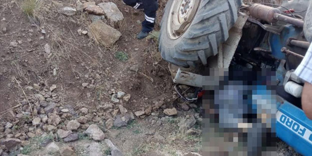 Traktörün altında kaldı!